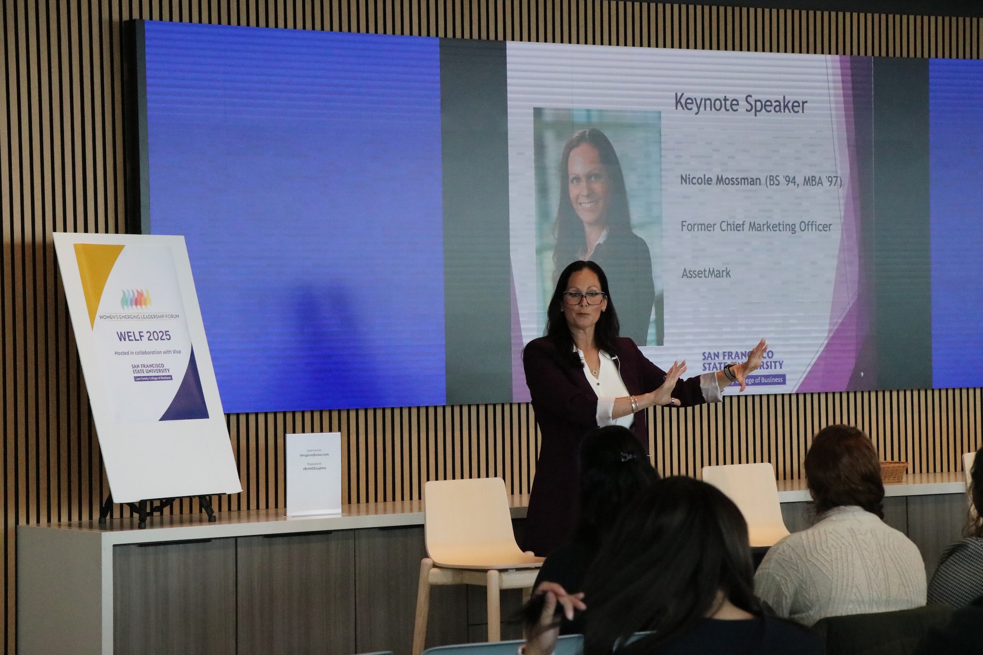 WELF 2025, woman on a stage speaking to audience