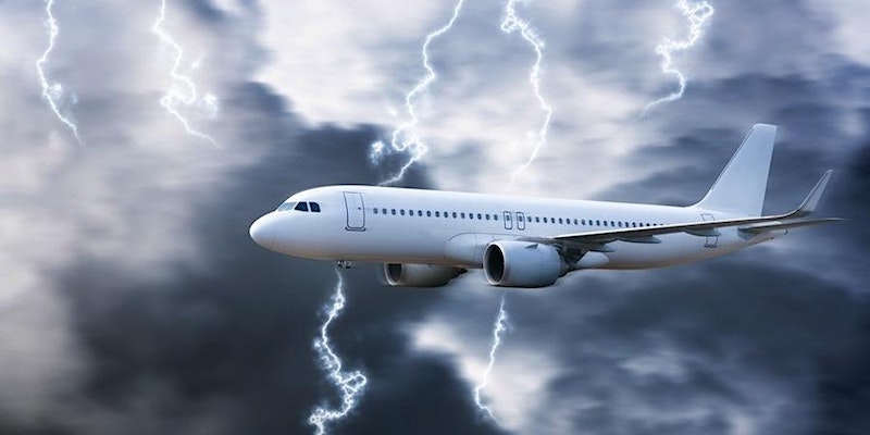 plane in stormy skies